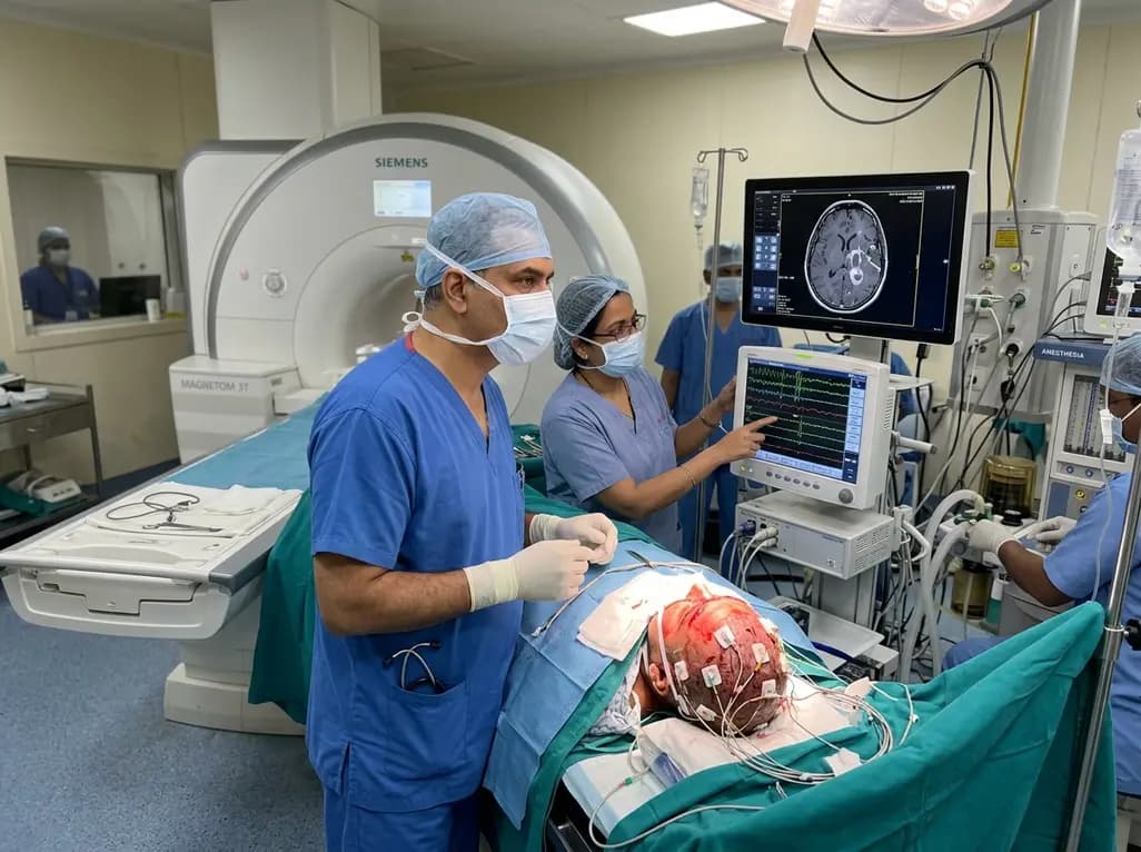 Brain Surgery with Safe Intraoperative 3-T MRI and Neuromonitoring